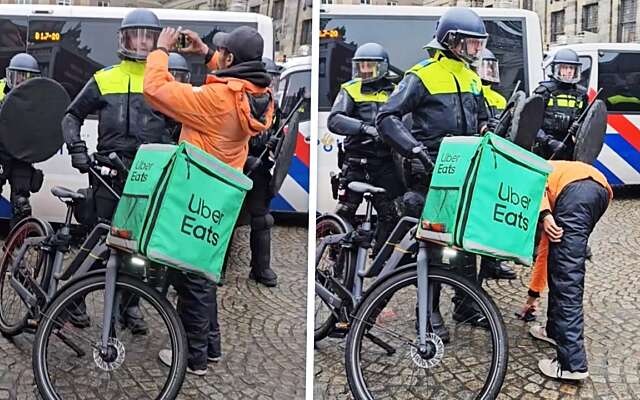 Geïrriteerde ME'er tikt telefoon van filmende Uber Eats-bezorger uit zijn handen