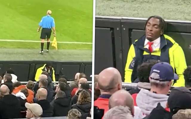 Steward maakt powernap tijdens wedstrijd van de Ajax legends tegen Real Madrid