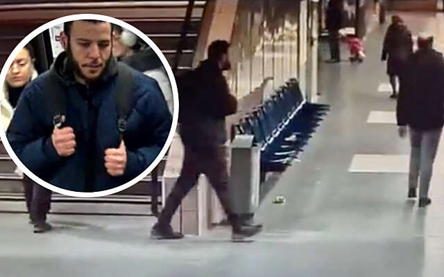 Onbedoelde botsing op station eindigt in chaos: hondsdolle gek steekt man in zijn nek (VIDEO)