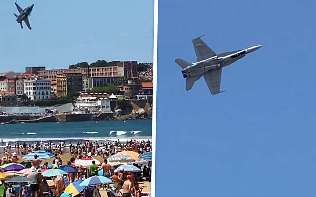 Spaanse stuntpiloot in F-18 crasht bijna op een vol strand in Gijón