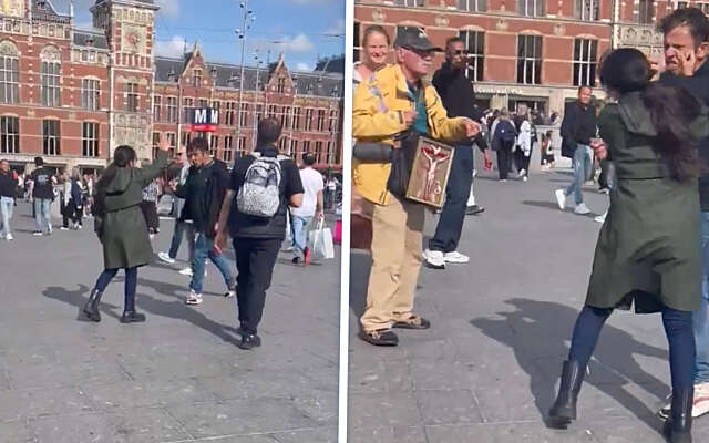 Straatprediker Yerani aan d'r haren over straat gesleurd in Amsterdam